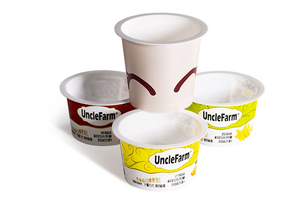 https://www.honokage.com/wp-content/uploads/2018/11/IML-yogurt-container-packaging2-1.jpg